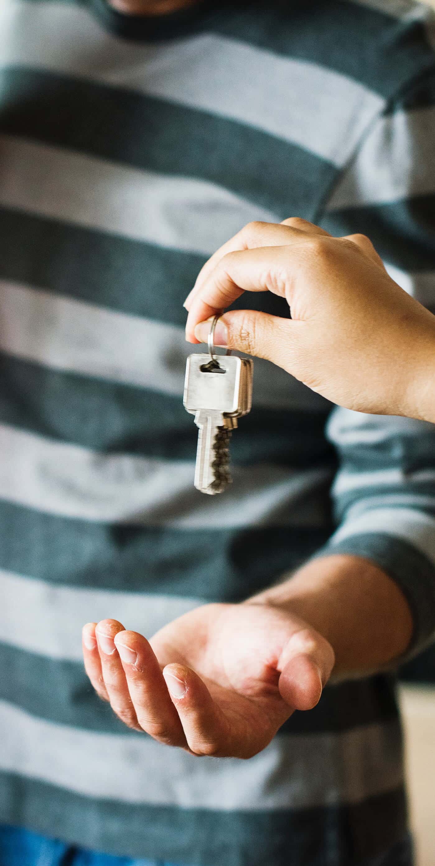 receiving keys to newly purchased real estate