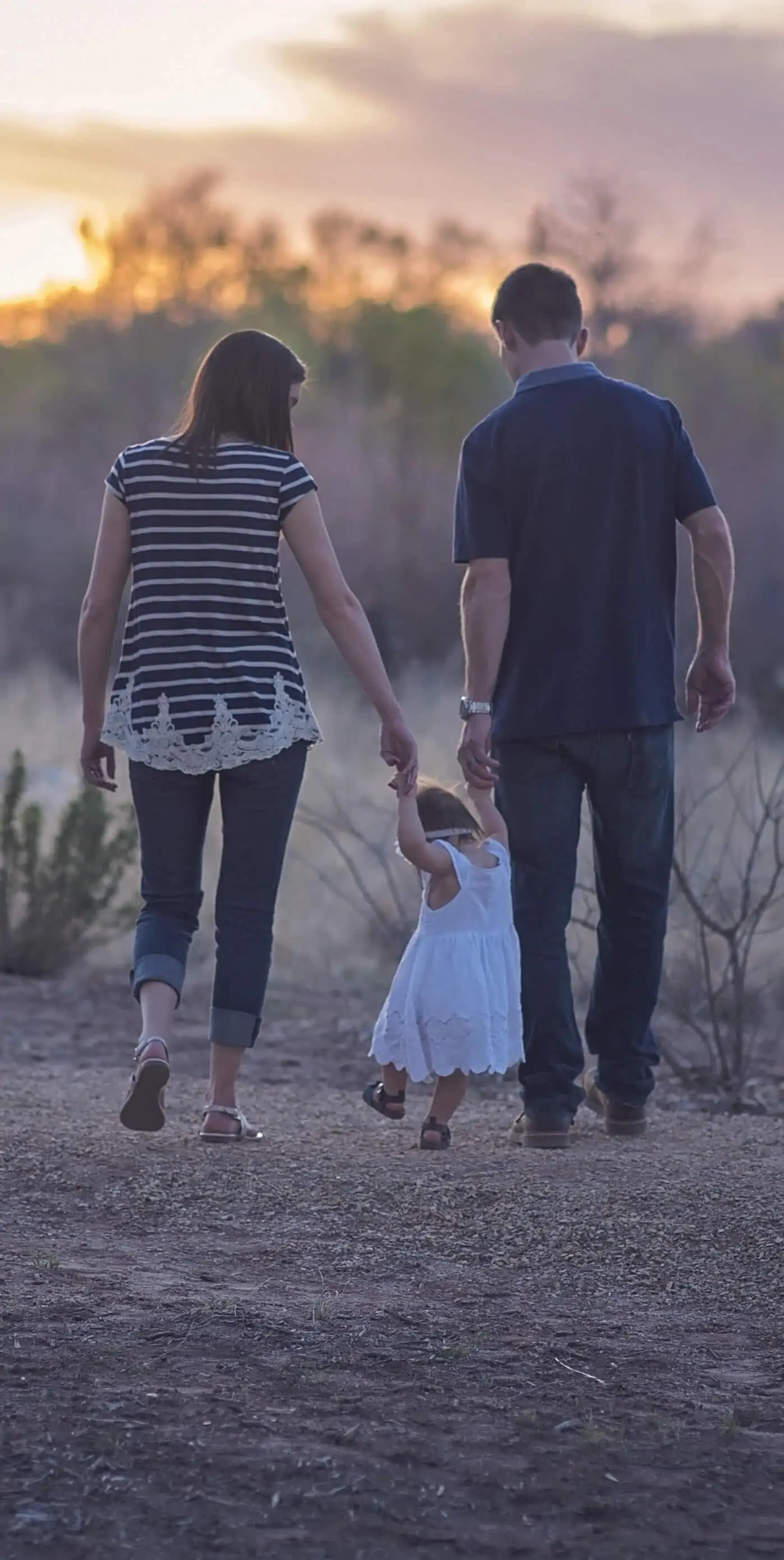 Small and young family on a walk